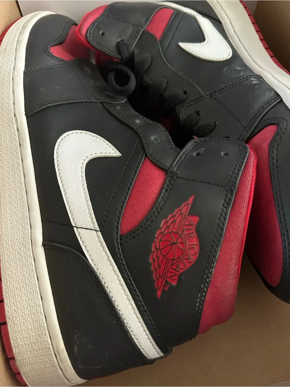 Jordan Men’s Black/Red/White Mid-Top Sneakers